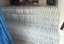 Percheziții într-un dosar de contrabandă: anchetatorii au ridicat peste 4200 de litri de alcool